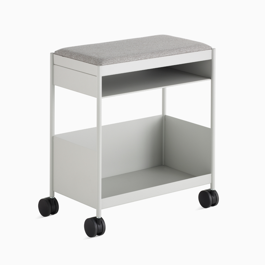 Grey, individual OE1 Storage Trolley with casters, viewed from an angle.