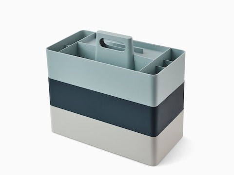 Grey, dark blue and light blue OE1 Workbox storage boxes stacked on top of each other, viewed from an angle.