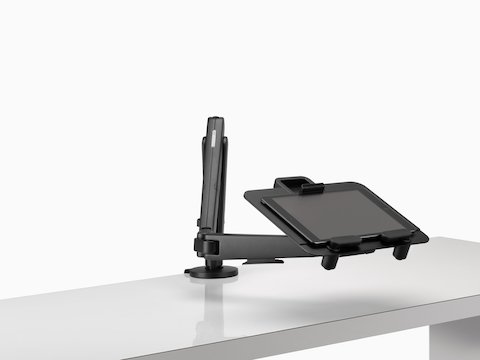 A tablet supported by an Ollin Laptop and Tablet Mount connected to a black Ollin Monitor Arm.