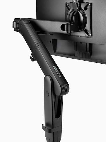 A black Ollin single-monitor arm, viewed from the back.