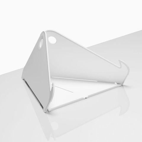 Raised and angled view of an open Oripura Laptop Stand placed on top of a worksurface. Raised and angled view of an open Oripura Laptop Stand placed on top of a worksurface.