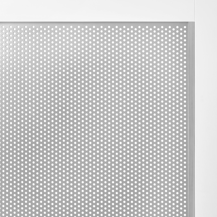 A close-up of gray perforated metal on Overlay's white structure.