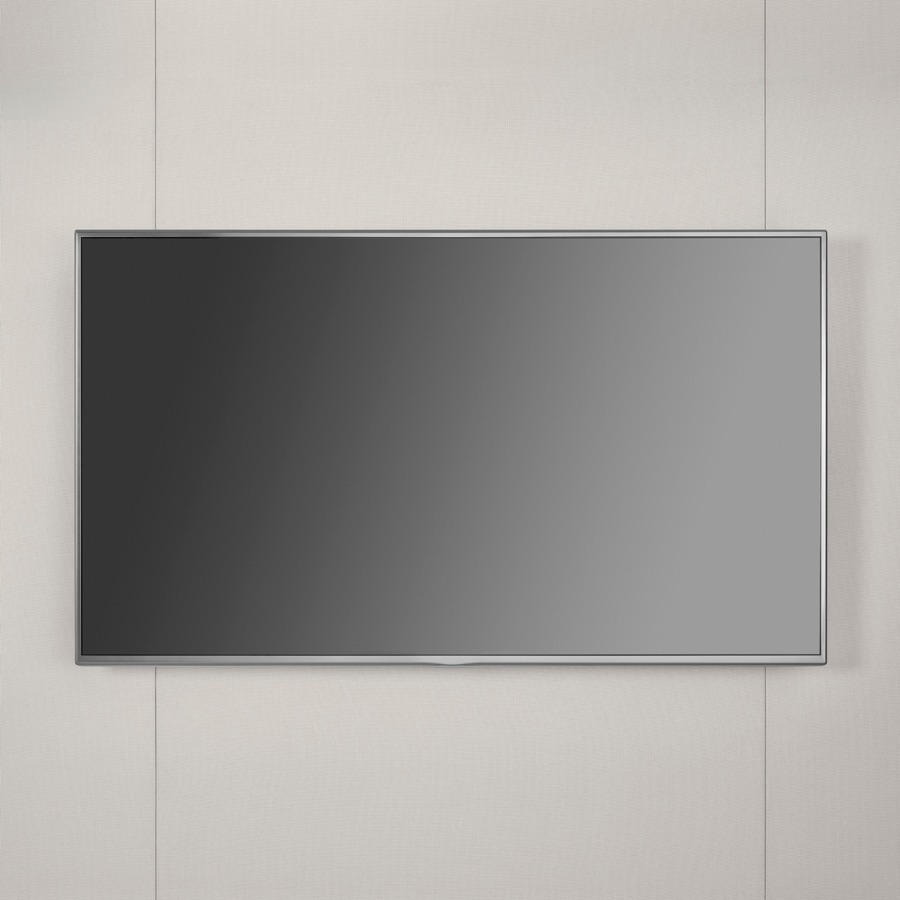 Una imagen en primer plano de un monitor de gran tamaño montado sobre una pared de tejido gris claro Overlay.