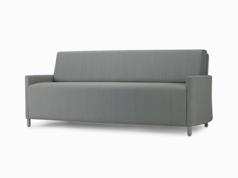 A beige-patterned Pamona Flop Sofa converted into a sleep surface with a sheet and pillow. A beige-patterned Pamona Flop Sofa converted into a sleep surface with a sheet and pillow.