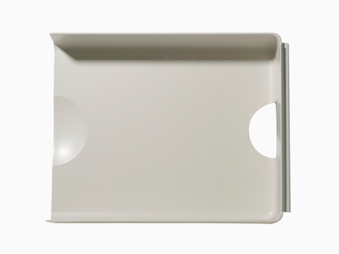 Overhead view of a putty-colored Paper Tray.