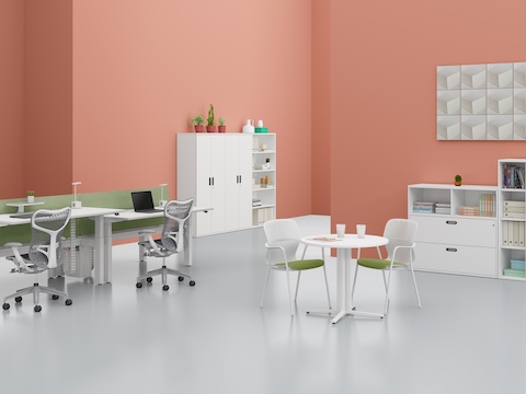Various Paragraph Storage elements, including a cabinet, drawer unit, open modules, and lockers, support an interaction space. Various Paragraph Storage elements, including a cabinet, drawer unit, open modules, and lockers, support an interaction space.