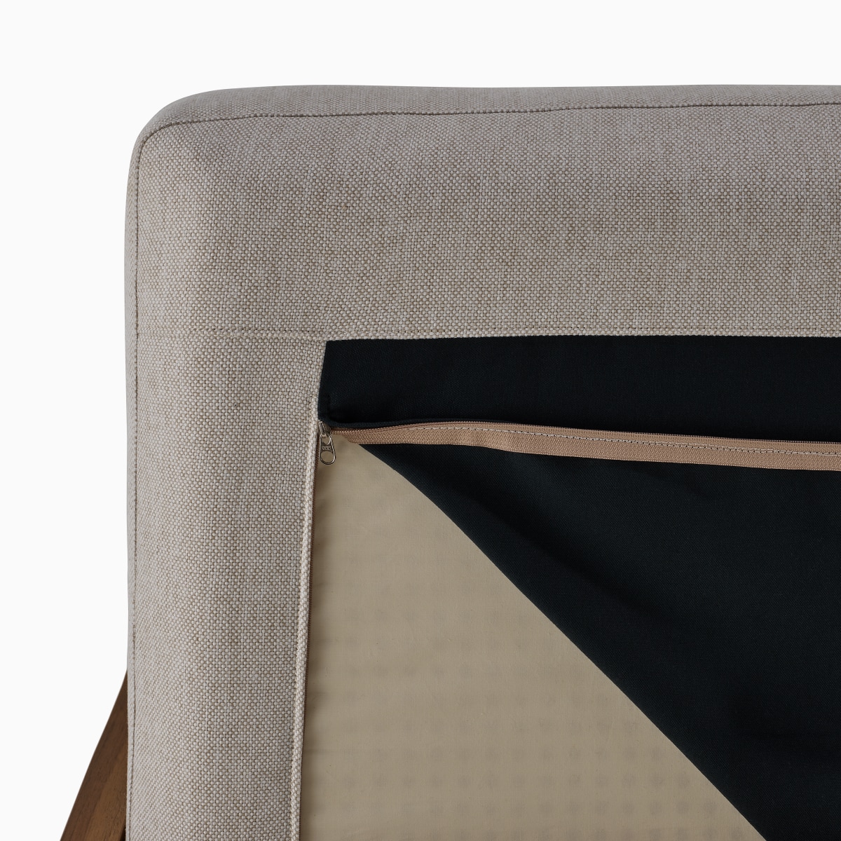 A detail view of the opened Latex cushion of the Pawson Drift Sofa in grey cushions