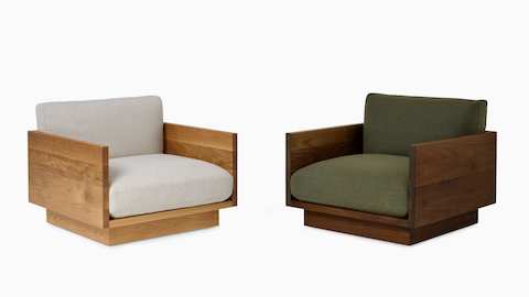 Pawson Drift Lounge Chairs in oak frame and grey cushions and a walnut frame with green cushions.