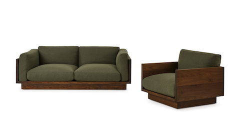 Pawson Drift Lounge Chair and Sofa in a walnut frame and green cushions.