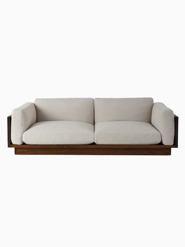 A front view of the Pawson Drift Sofa in walnut frame and grey cushions