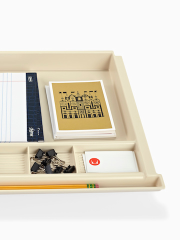 A pencil drawer stocked with work supplies. Select to go to the Pencil Drawer product page.