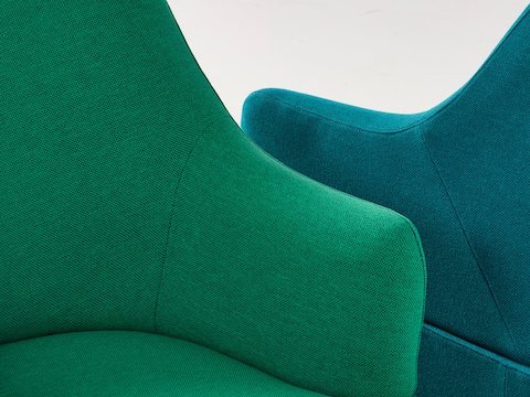 Close view of two Plex upholstery options in shades of green and blue. Close view of two Plex upholstery options in shades of green and blue.