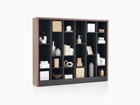 Port Storage System with a wooden frame and black shelves being used as a decorating cabinet.