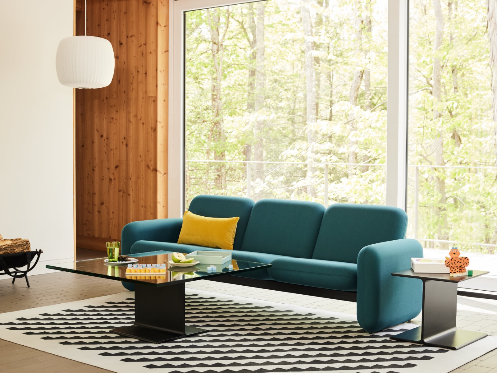 A Wilkes Modular Sofa and I Beam Tables in a living room.