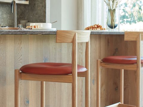 Two Comma Counter Stools at a breakfast bar in a kitchen.