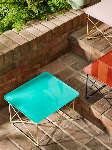 Herman Miller x HAY outdoor setting with Eames Wire Base Low Table in mint.