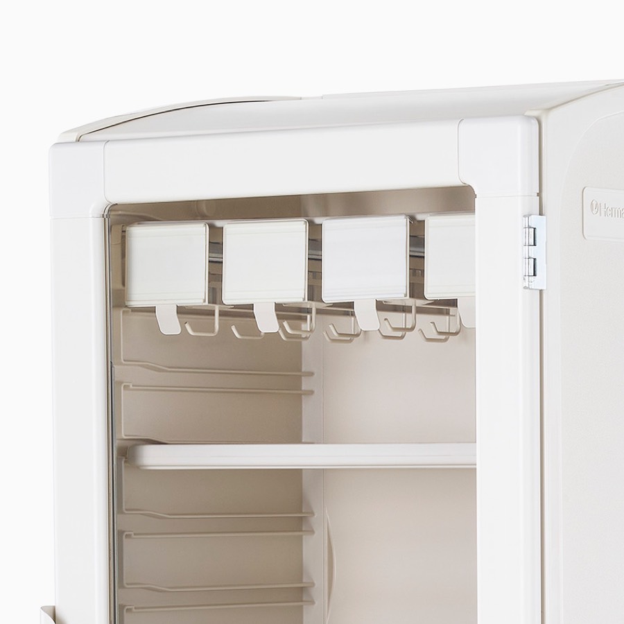 Detail of catheter racks and shelves in a mobile storage locker.