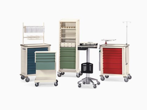 A collection of Herman Miller healthcare carts, including four Procedure/Supply Carts and one Mobile Technology Cart. A collection of Herman Miller healthcare carts, including four Procedure/Supply Carts and one Mobile Technology Cart.