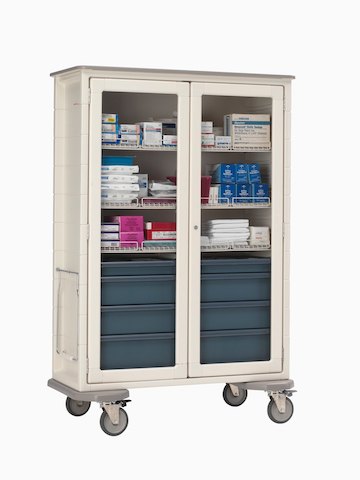 A vertical Procedure/Supply cart with clear doors for quick retrieval of medical supplies. A vertical Procedure/Supply cart with clear doors for quick retrieval of medical supplies.