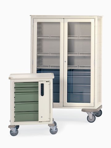Two Procedure/Supply Carts, one with drawers and keyless entry and one with clear doors and keyed entry. Two Procedure/Supply Carts, one with drawers and keyless entry and one with clear doors and keyed entry.