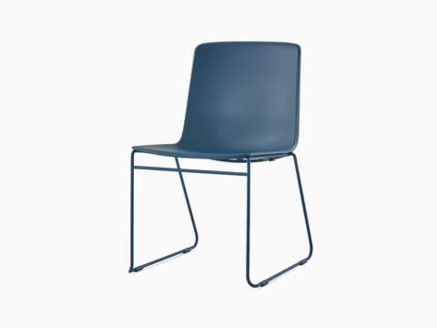 A peacock blue Pronta Stacking Chair with a chrome base and glides.