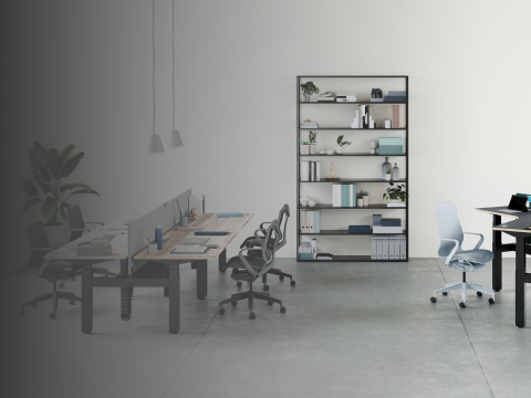 An open office environment with a cluster of three Ratio 120-degree desks positioned at varying heights, and a large Ratio bench with high- and low-back Cosm Chairs. An open office environment with a cluster of three Ratio 120-degree desks positioned at varying heights, and a large Ratio bench with high- and low-back Cosm Chairs.
