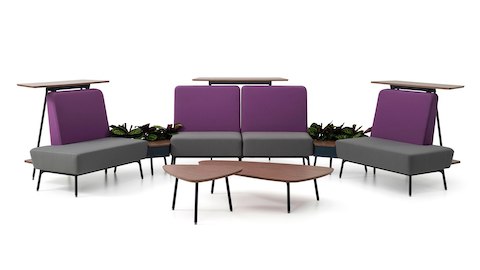Three Sabha Collaborative Seating modules with purple backs and gray seats, each backed by a standing surface. Three Sabha Collaborative Seating modules with purple backs and gray seats, each backed by a standing surface.