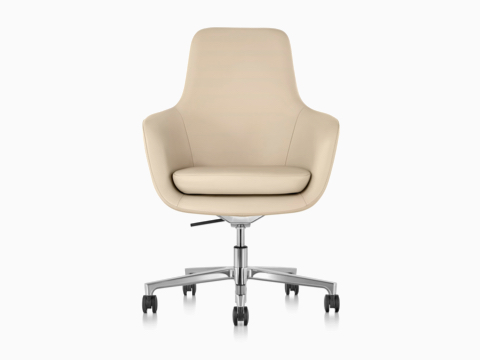 High-back Saiba Chair in tan leather, viewed from the front. High-back Saiba Chair in tan leather, viewed from the front.