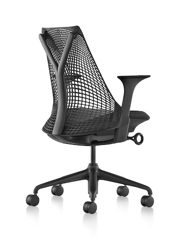Rear view of a black Sayl office chair, showing the suspension tower that supports the back. Rear view of a black Sayl office chair, showing the suspension tower that supports the back.