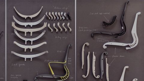 The individual components of a disassembled Setu office chair.