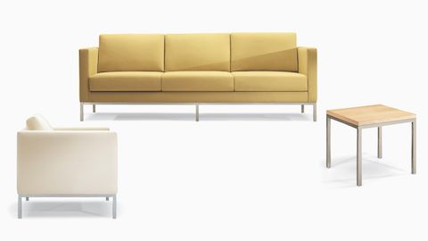 Grouping of Nemschoff Riva Family including Nemschoff Riva Armchair, Sofa, and Table.