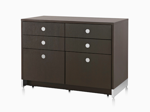 Angled view of a Sled Base Storage double unit consisting of four box drawers and two file drawers. 