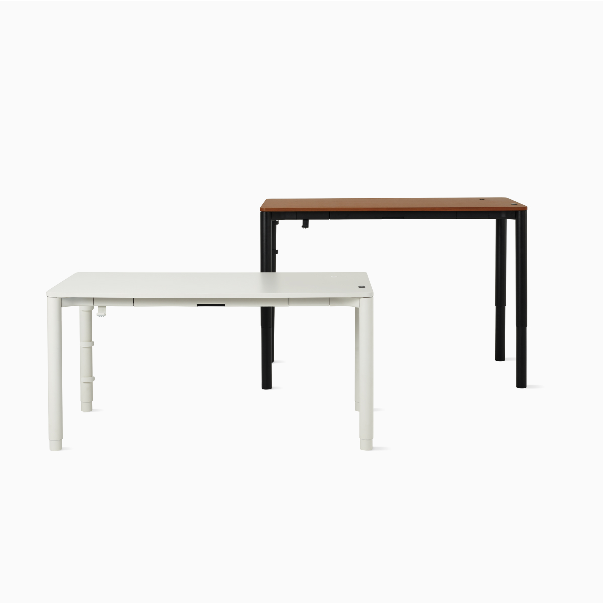 Two four leg height adjustable tables, one in white and other with a dark woodgrain surface and black legs shown at standing posture.