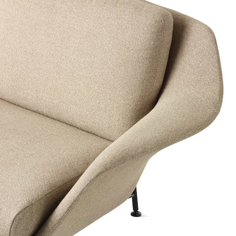 A detail image of a Striad Low-Back Sofa with Three-Seats in tan.