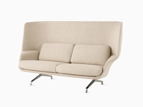 A high-back Striad Sofa in cream. A high-back Striad Sofa in cream.