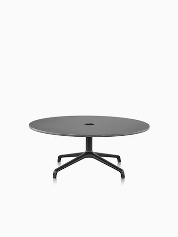 Striad occasional table with laminate surface.