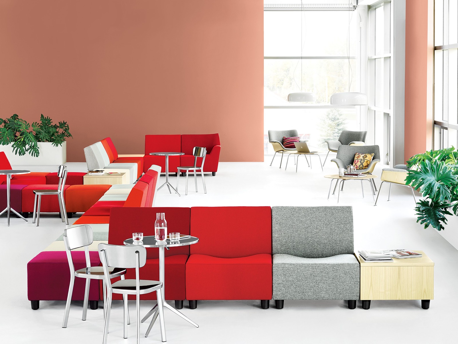 Gathering space featuring Swoop Lounge Furniture, both modular seating components and lounge chairs Gathering space featuring Swoop Lounge Furniture, both modular seating components and lounge chairs