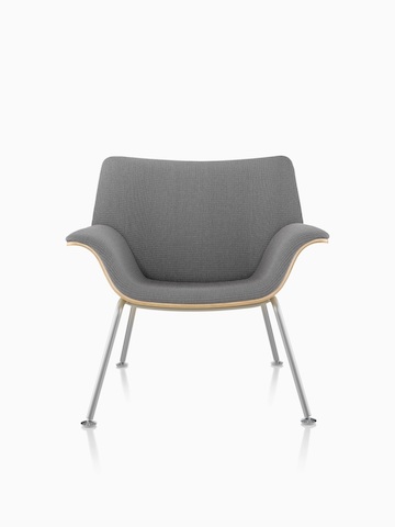 A gray Swoop Plywood Lounge Chair.