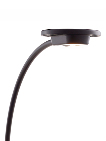 Close view of the lamp head on a black Tone Personal Light.