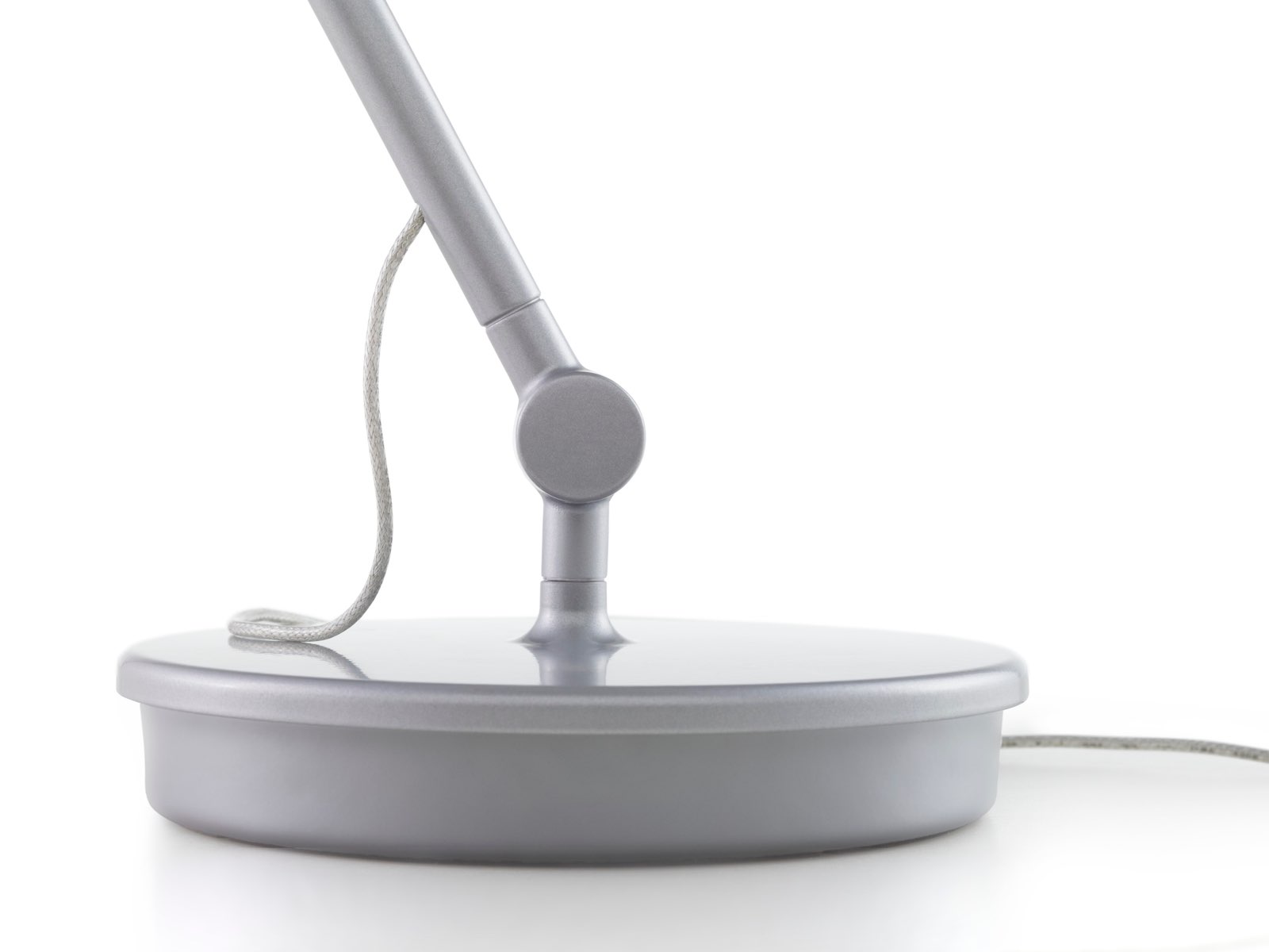 Close-up of the compact base on a Tone Personal Light. Close-up of the compact base on a Tone Personal Light.