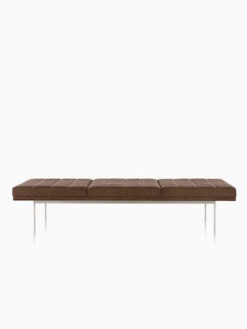 A three-seat Tuxedo Bench with brown upholstered cushions. 