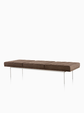 A three-seat Tuxedo Bench with brown upholstered cushions. Select to go to the Tuxedo Benches product page.