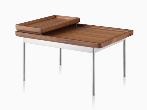 An angled view of a rectangular Tuxedo Table and nesting tray, both with a medium woodgrain finish. 