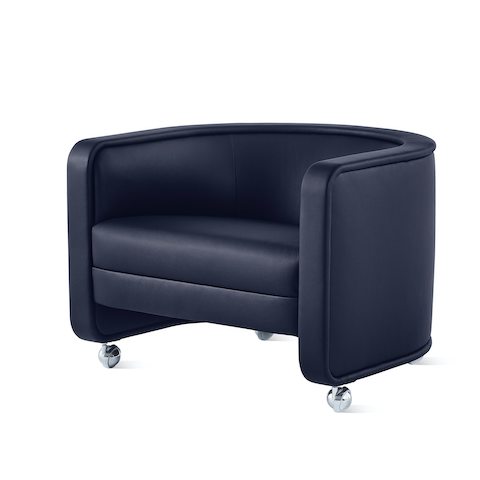 U-Series Lounge Chair with casters upholstered in Tenera Sapphire.
