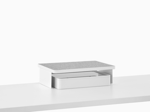 A Ubi Freestanding Shelf with a non-skid surface and a storage box below.