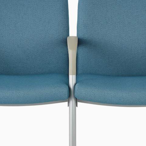 Detail of the intervening arm on a Valor Multiple Seating chair.