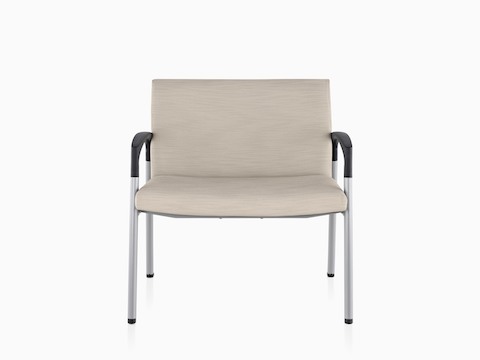 An extra-wide Valor Plus Seating chair with beige upholstery.