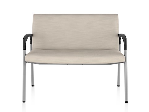 Beige Valor Plus Seating with an extra-wide seat, steel frame, and black arms, viewed from the front. Beige Valor Plus Seating with an extra-wide seat, steel frame, and black arms, viewed from the front.