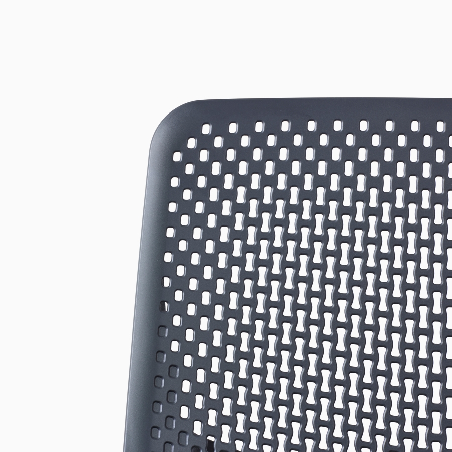 A close-up view of a Verus Chair's black Triflex back.