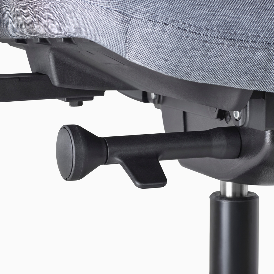 A close-up view of a Verus Chair's black adjustment knob.